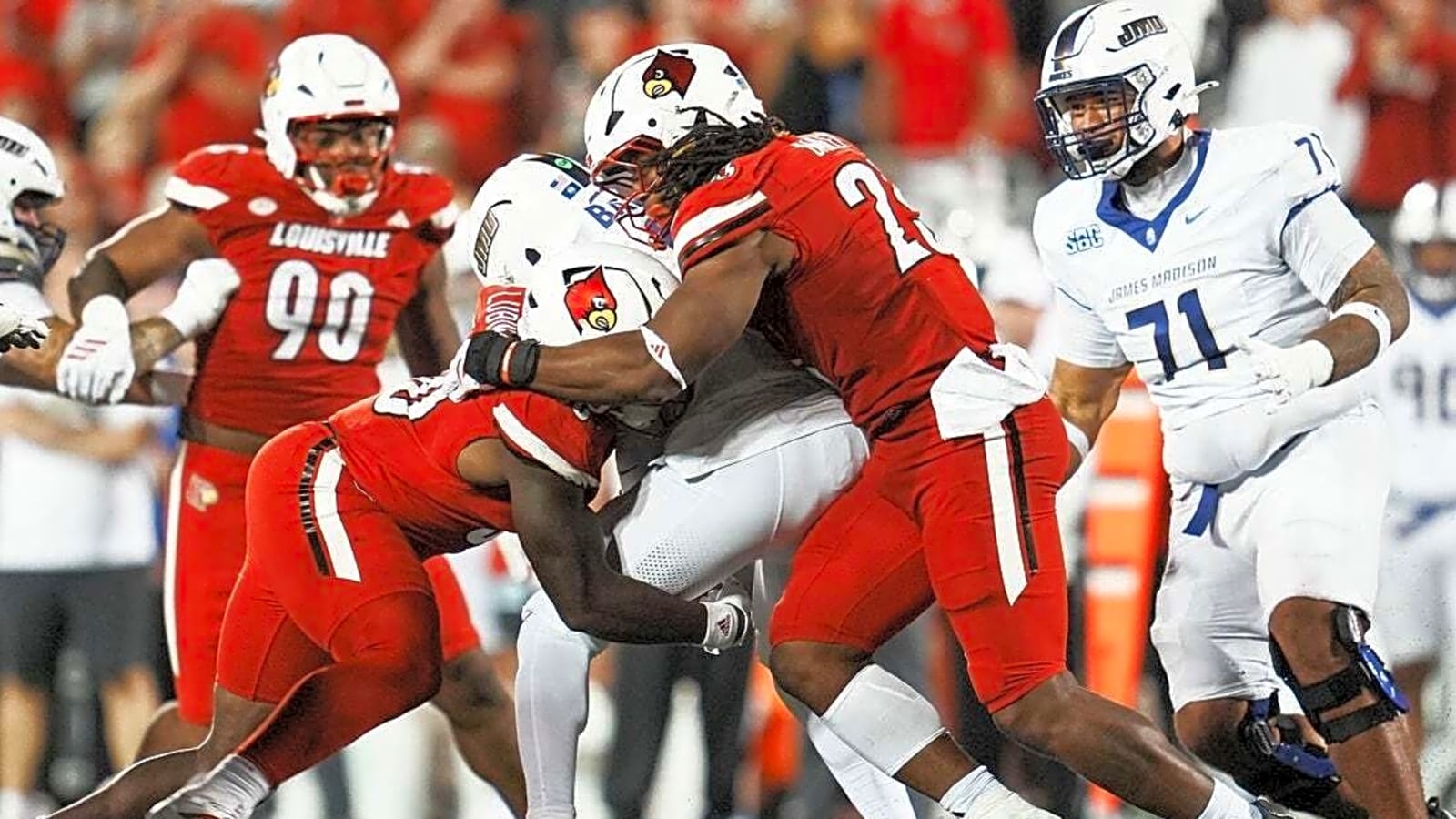 Defense helps Louisville rally for win over James Madison