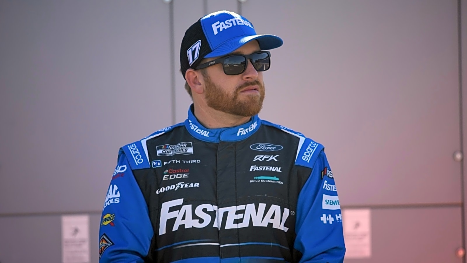 Kevin Harvick reacts to Chris Buescher post-race dejection following Michigan