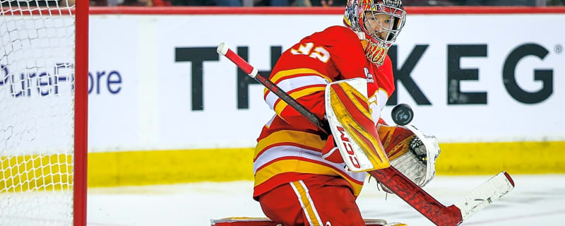Flames goaltender Dustin Wolf missed scoring his first NHL goal by a few feet