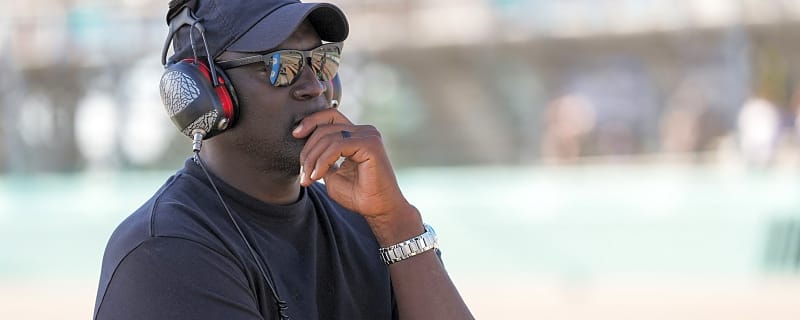 NBA legend Michael Jordan draws Magic Johnson’s attention after Tyler Reddick’s COTA win