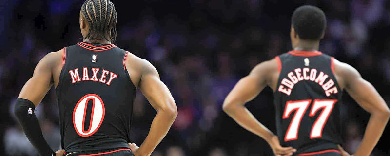 Watch this 76ers fan causally sink half court shot to earn $10,000
