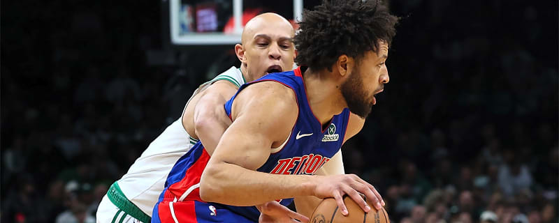 Pistons’ Cade Cunningham gives Dirk Nowitzki his flowers before playing Mavericks