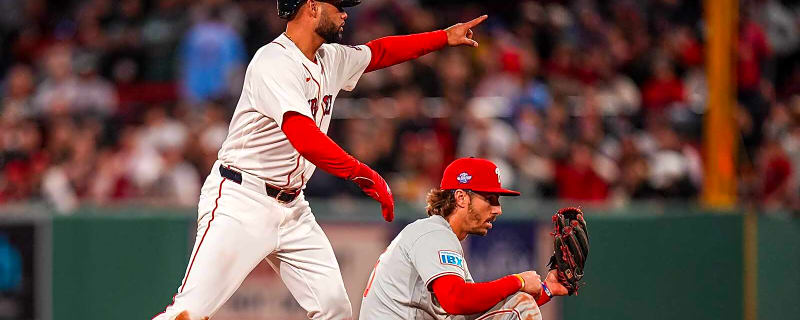 Did Red Sox fans with brown bags on heads behind home plate get punished?