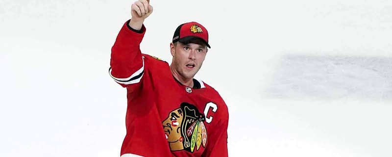 Blackhawks’ Connor Murphy glows over Jonathan Toews before Chicago return