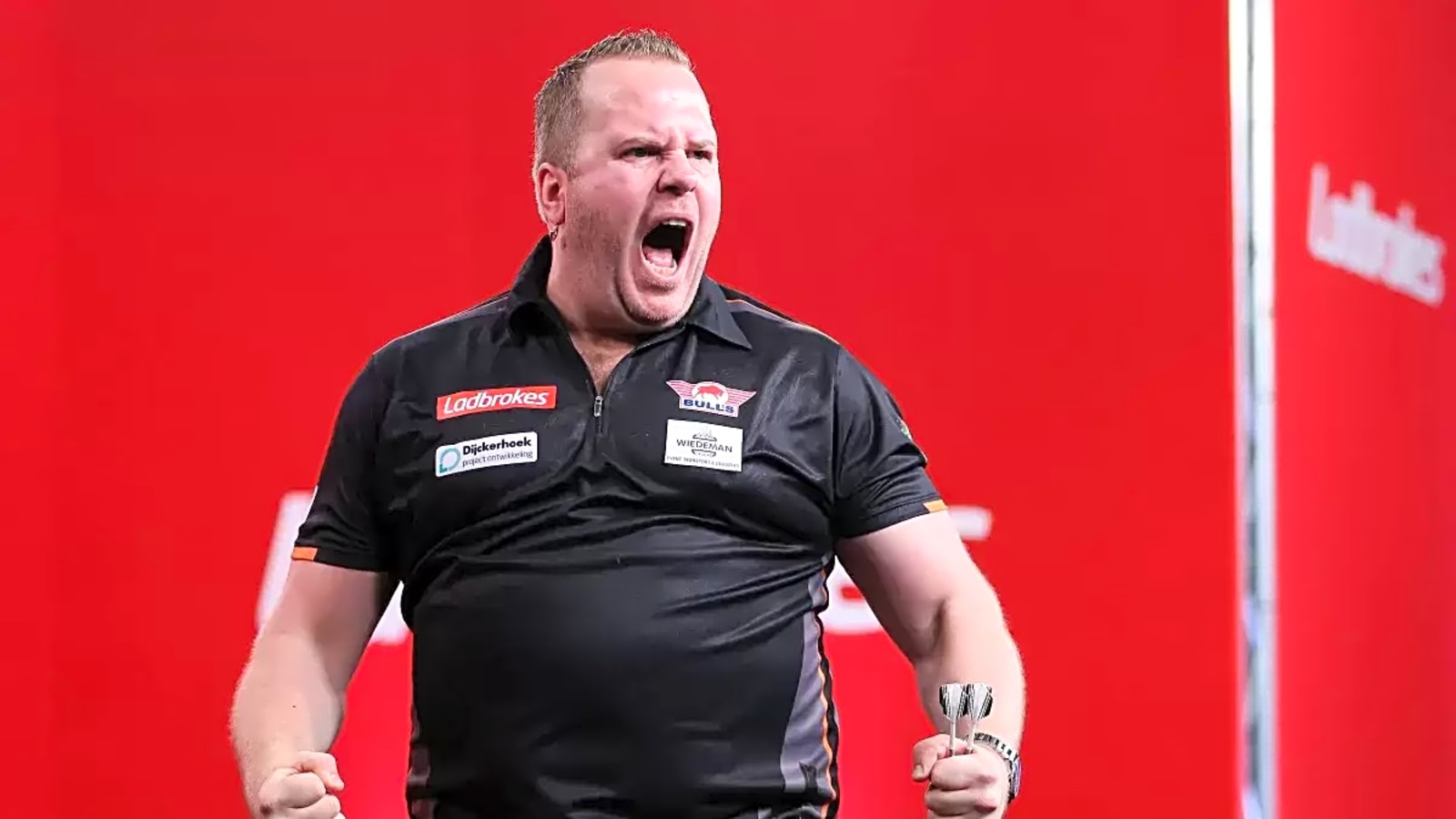 Dirk van Duijvenbode hits nine-dart finish during Players Championship 21 in Leicester