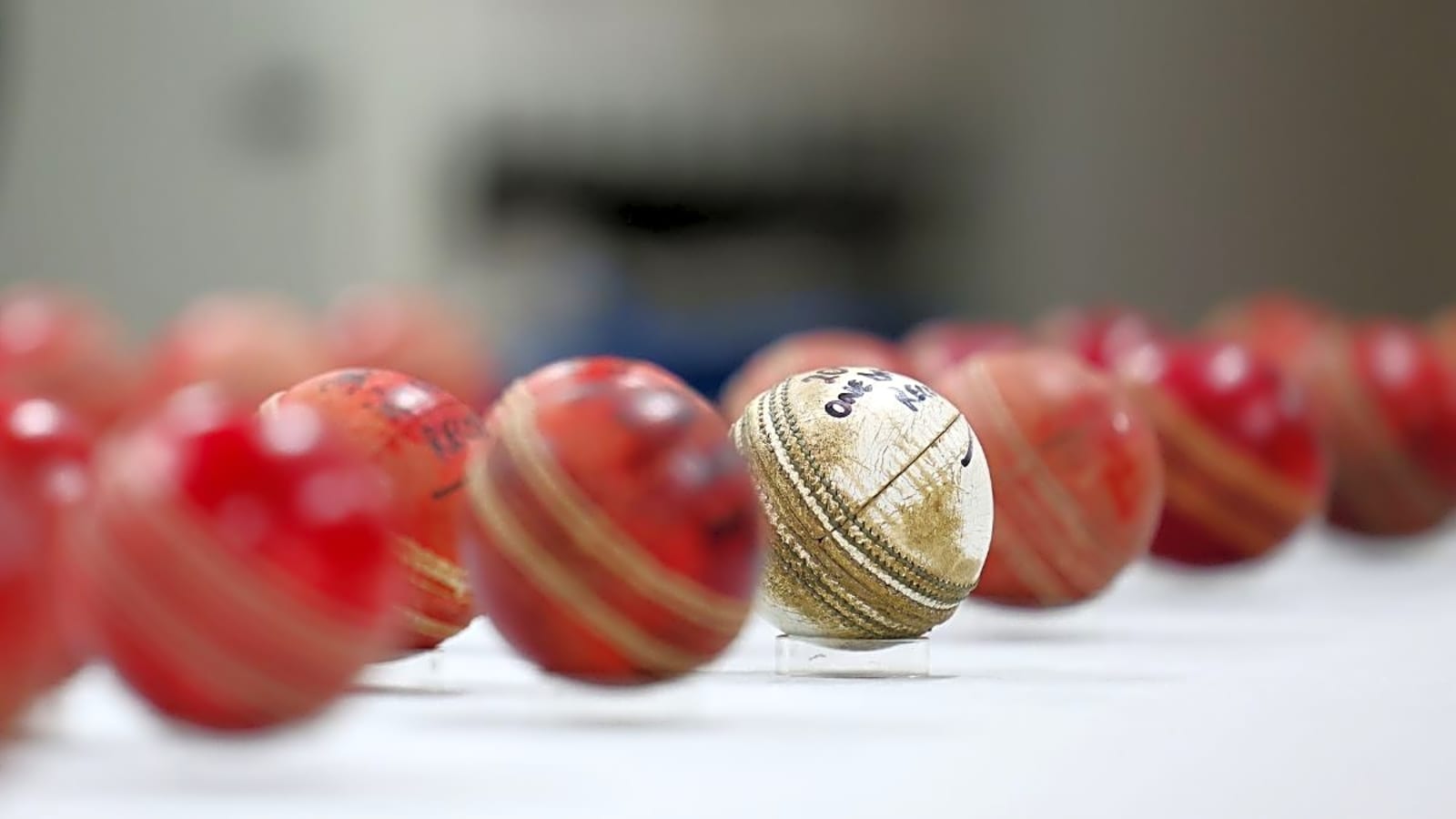 Why are cricket balls red, white and pink? Explained