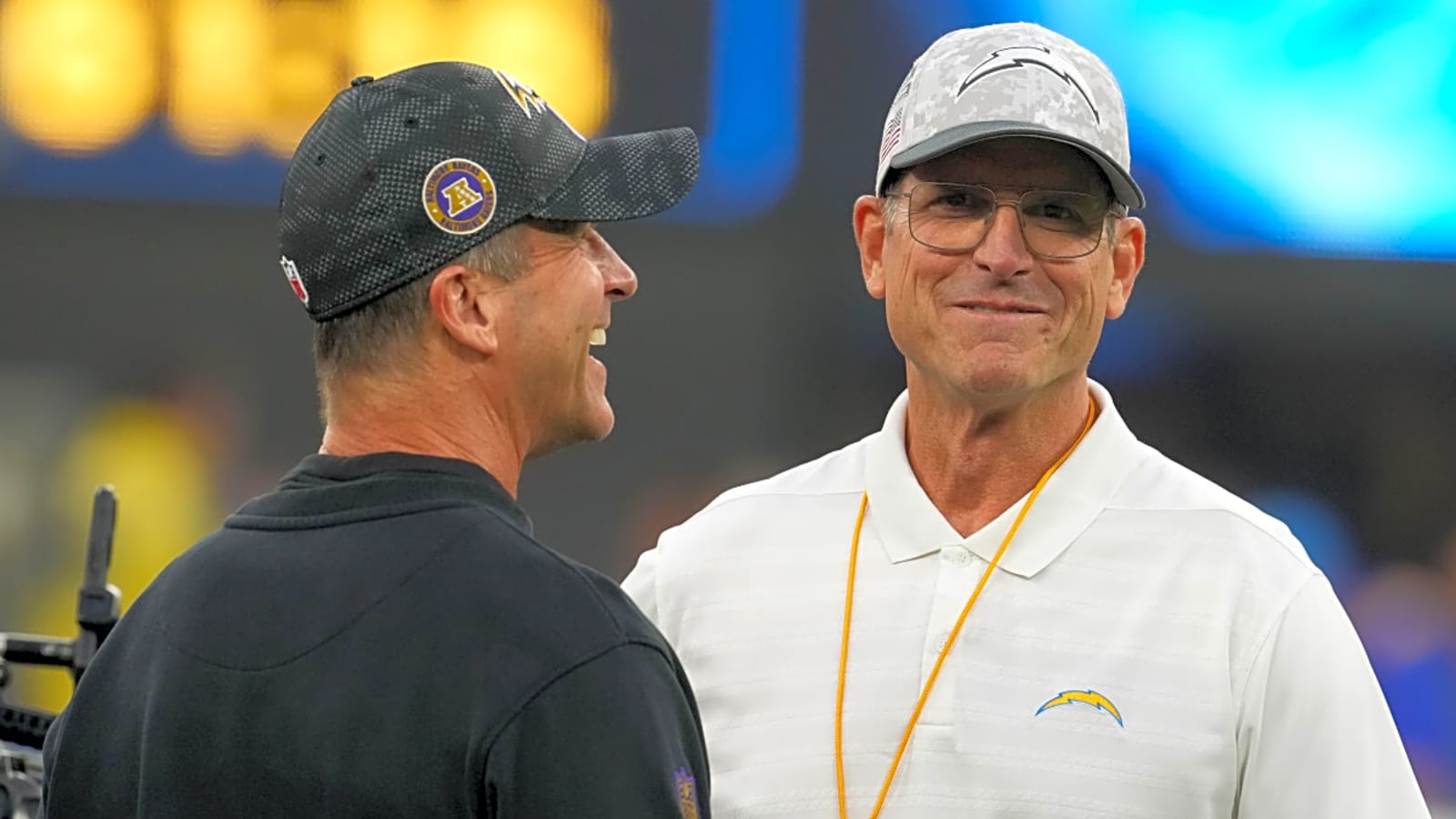 Watch: Ravens Coach Dodges Foul Ball, Catches Brother&#39;s Jokes