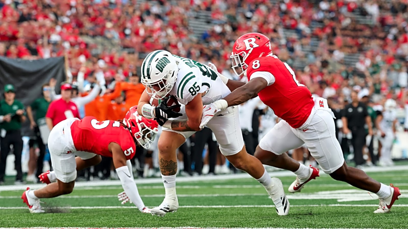 College Football Player Sleeps in Car and Wins Big Ten Scholarship