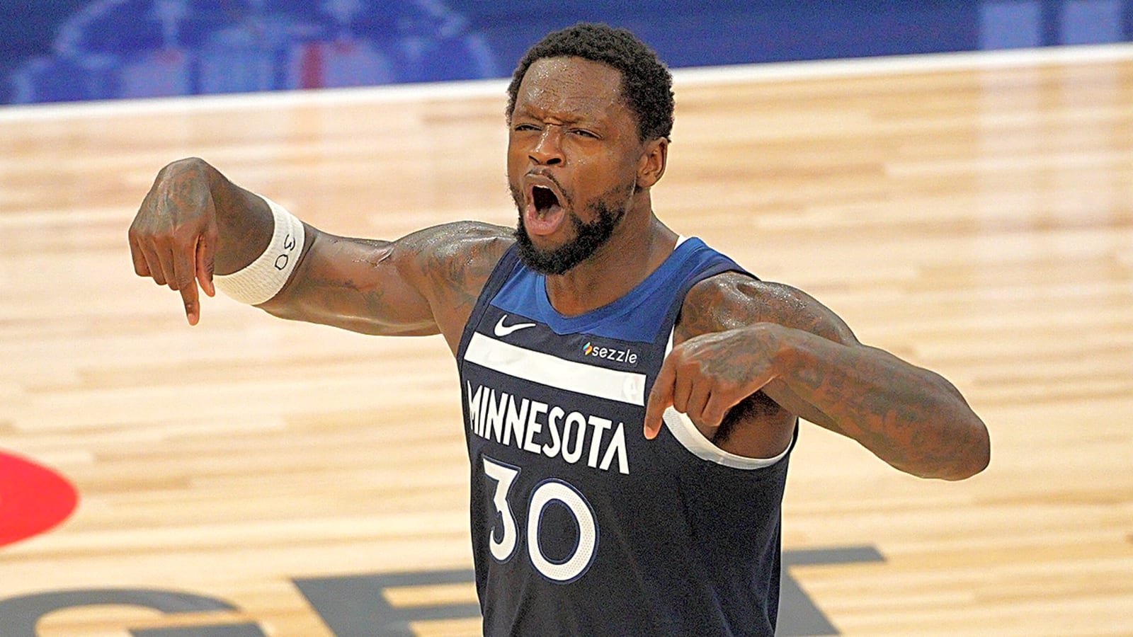 Timberwolves must choose between two big men this summer