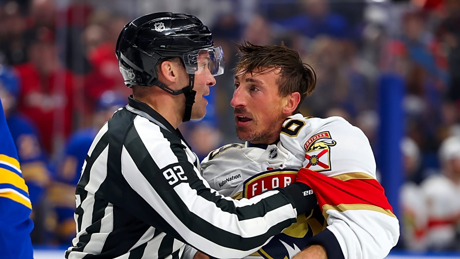 Brad Marchand steals and destroys opponent's helmet