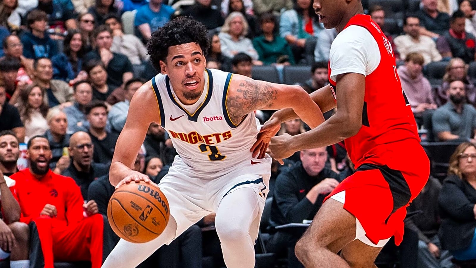 Nuggets exercising options on pair of young players