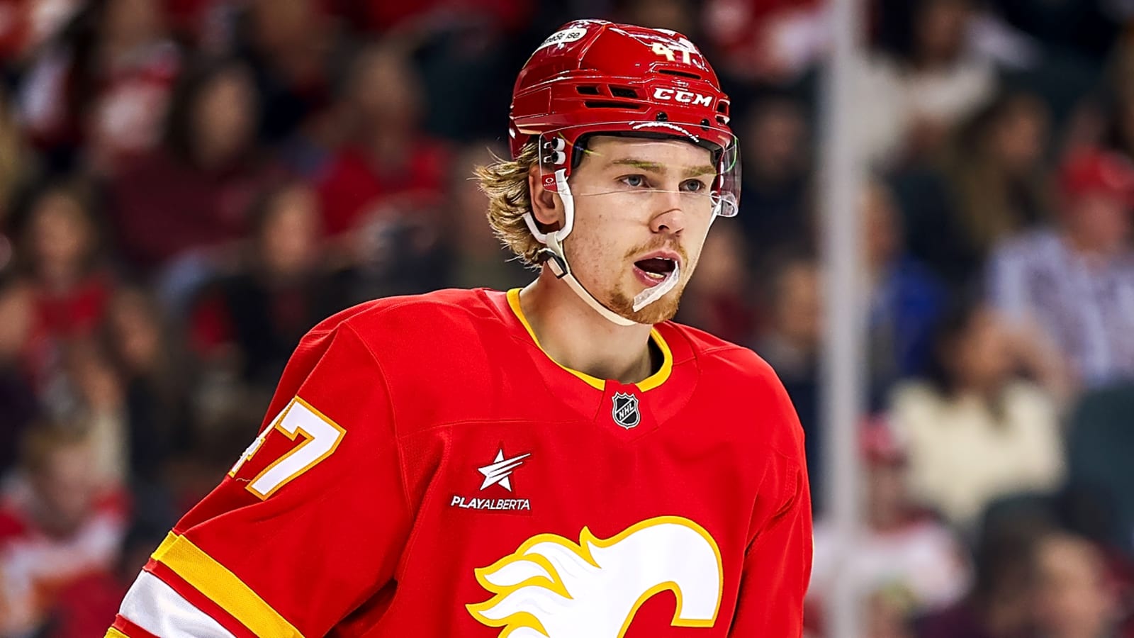 Flames sign young center to three-year extension