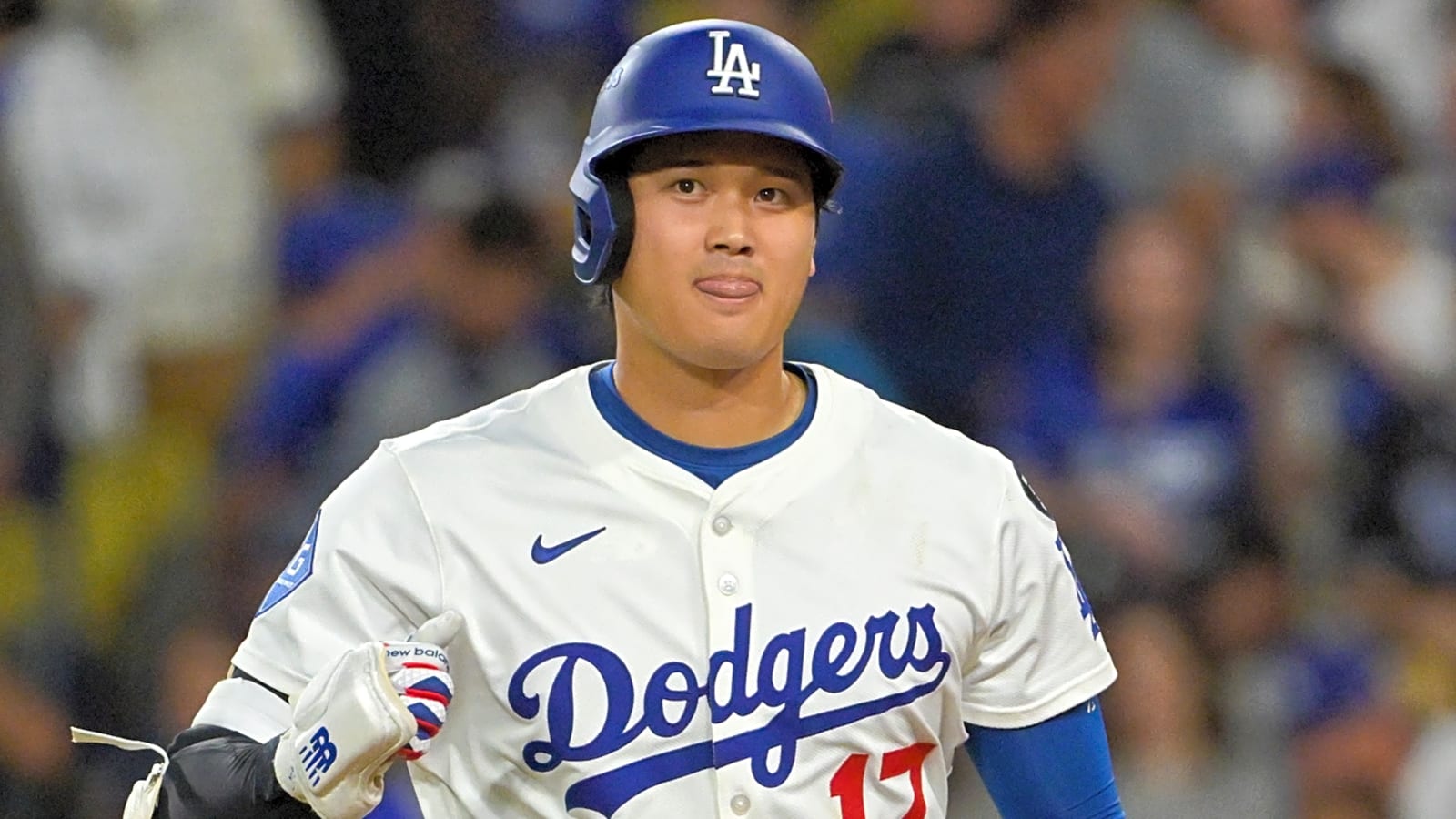 Dodgers flex muscles, eliminate Reds in wild-card round