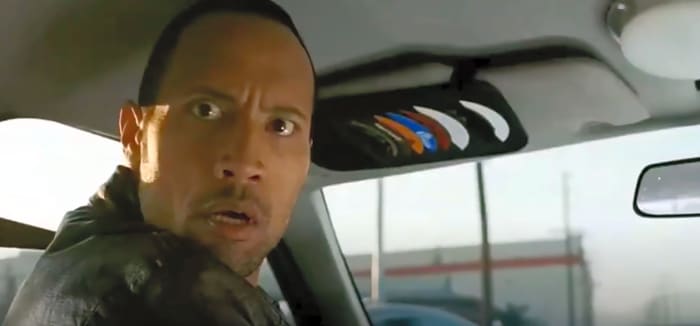 The Rock driving