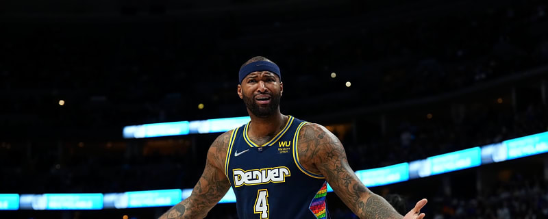DeMarcus Cousins pelted with drinks after heated moment with fan
