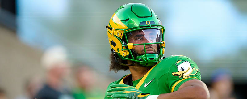 Oregon QB Dante Moore taken off on stretcher after cheap shot