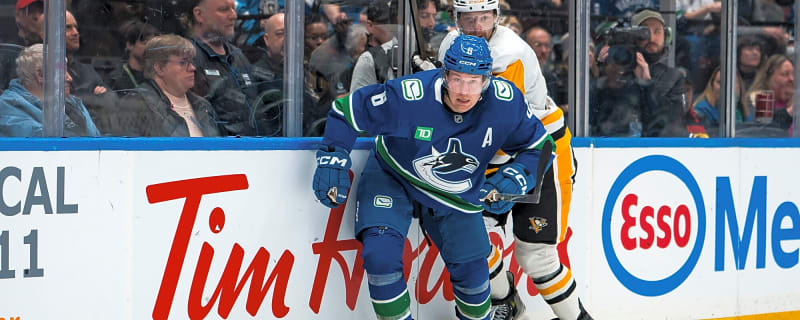 ‘Vicious hit to the head’: Foote and DeBrusk react after Canucks’ Boeser takes late hit from Bryan Rust