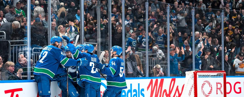 Scenes from summer skate: 30 players on the ice for well-attended Canucks scrimmage
