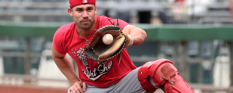 Athletics get help at catcher from the Reds
