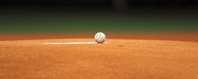 College baseball teams brawl after pitcher smashes into runner