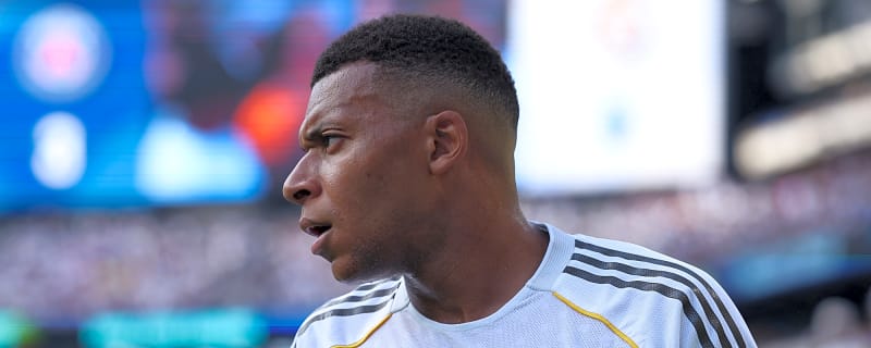 Kylian Mbappe celebrates after tying Cristiano Ronaldo's record