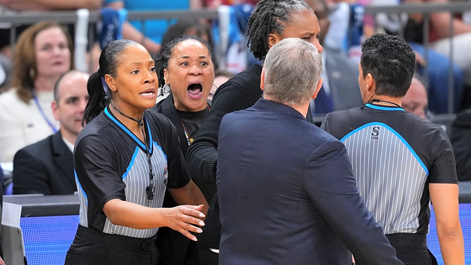 Sideline video reveals Dawn Staley's message for Geno Auriemma after heated confrontation