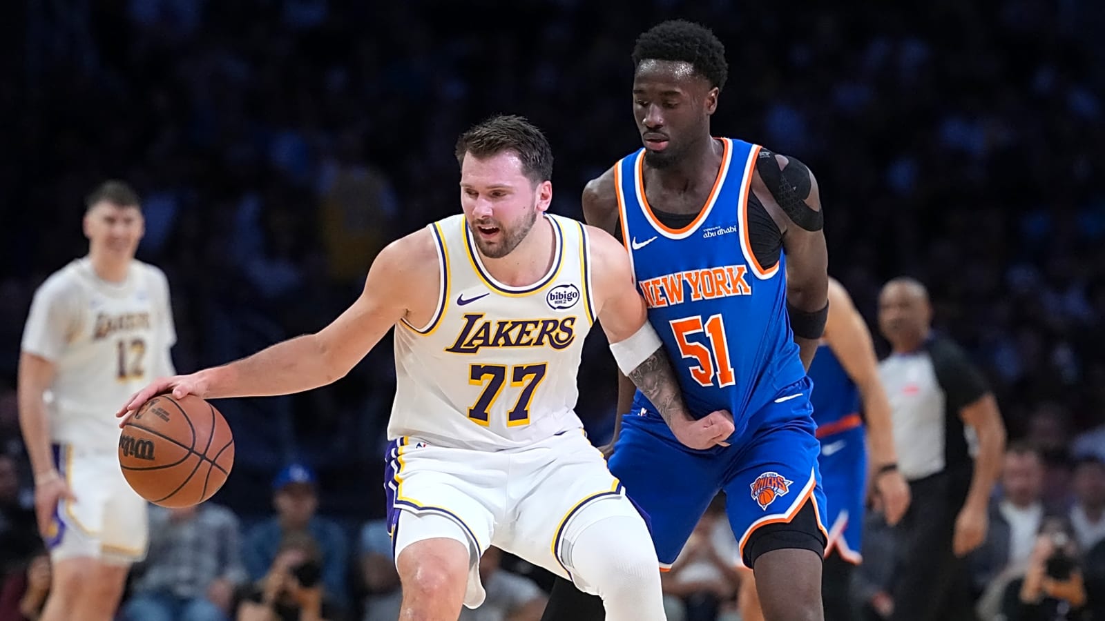 Luka Doncic appears to make the money sign at referee after no-call