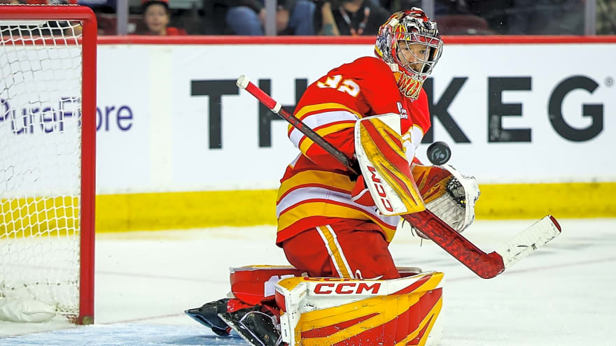 Flames goaltender Dustin Wolf missed scoring his first NHL goal by a few feet
