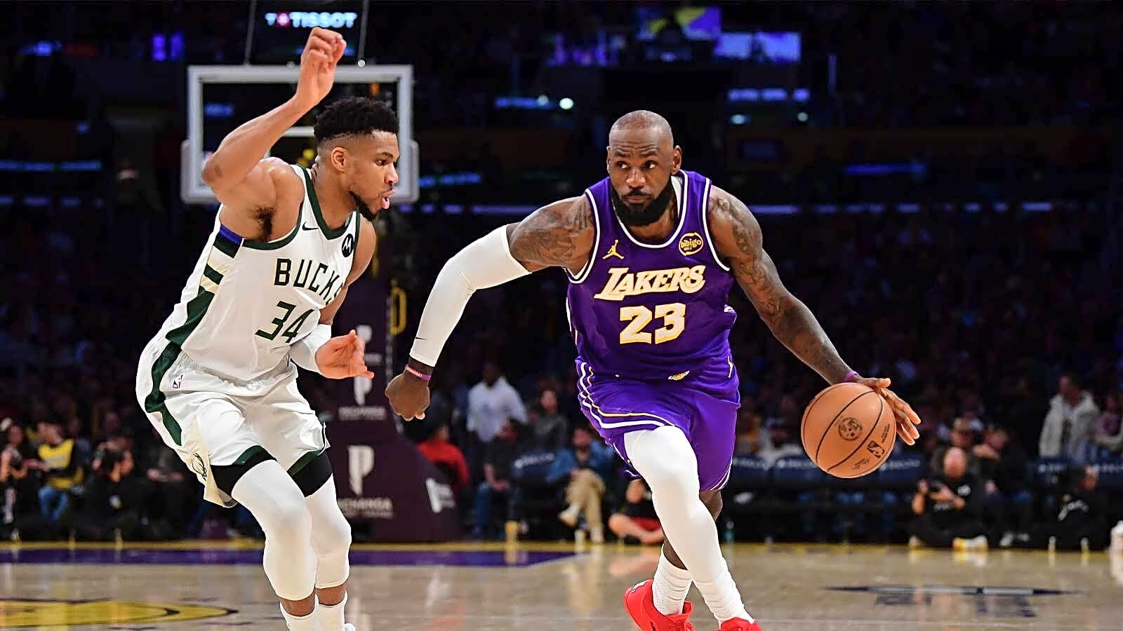 Giannis gives LeBron James his flowers after defeating Lakers