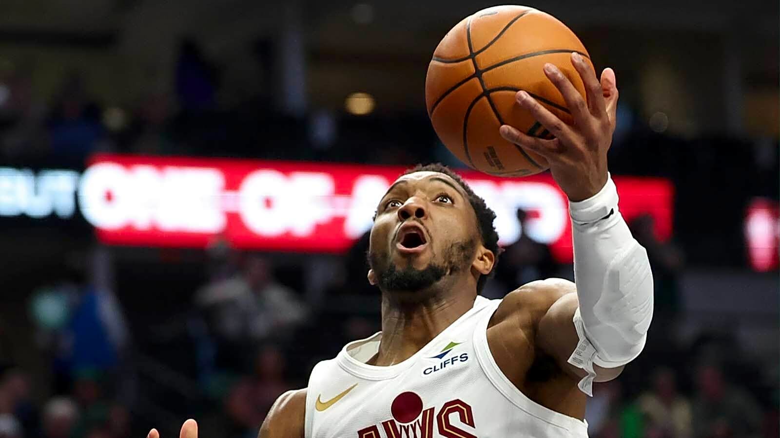 Watch Donovan Mitchell hit a windmill over Cooper Flagg