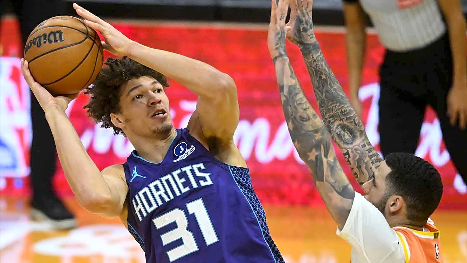 Hornets’ Charles Lee celebrates Tidjane Salaun for rounding out his game