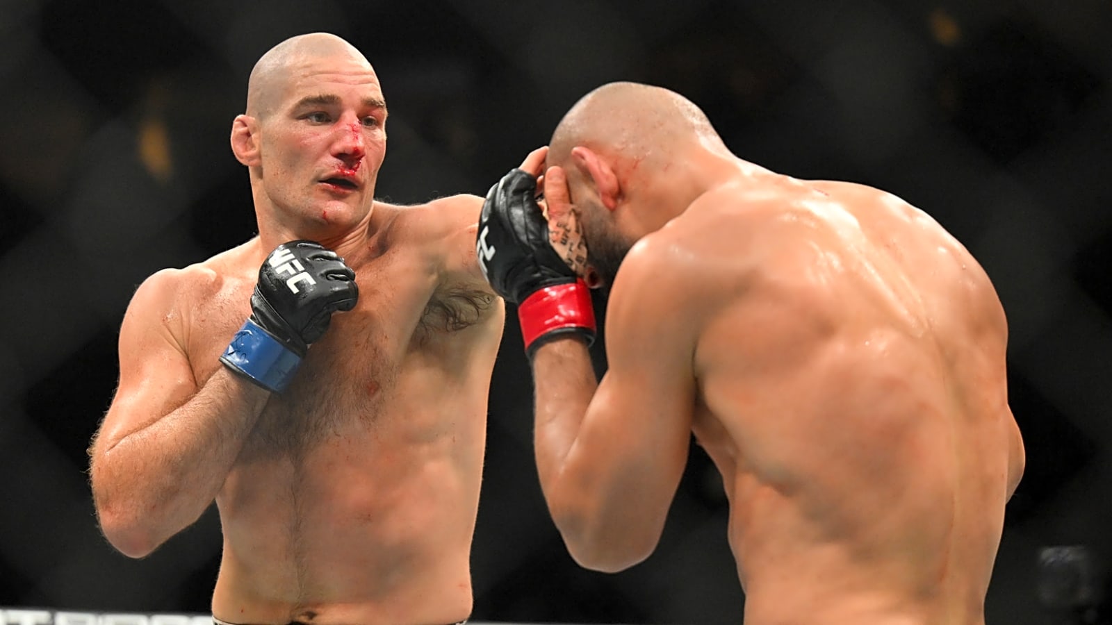 Sean Strickland hands Khamzat Chimaev first loss, reclaims belt
