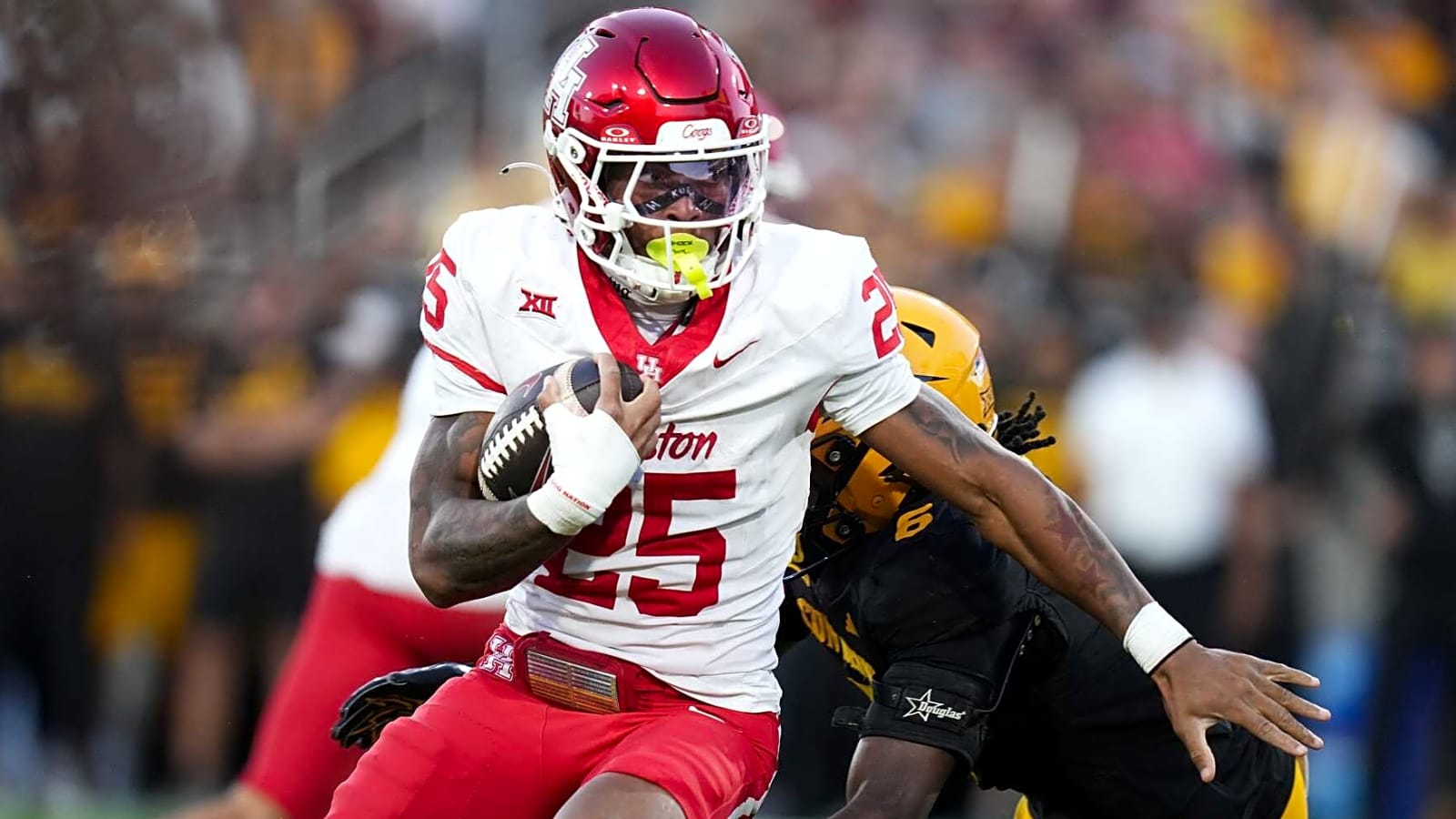 Houston forces way into CFP contention with big win at Arizona State