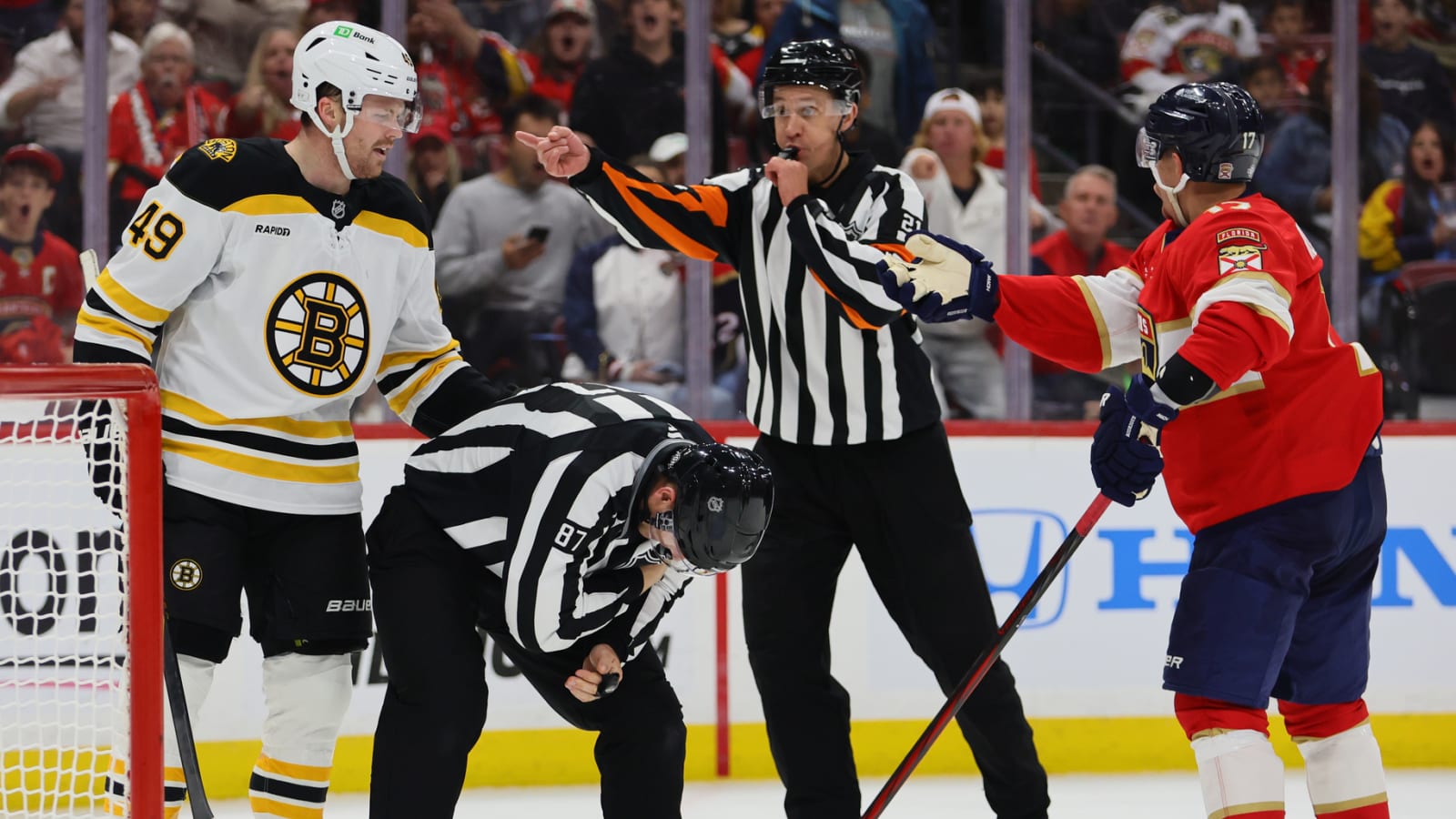 Watch: Bruins player accidentally slashes official