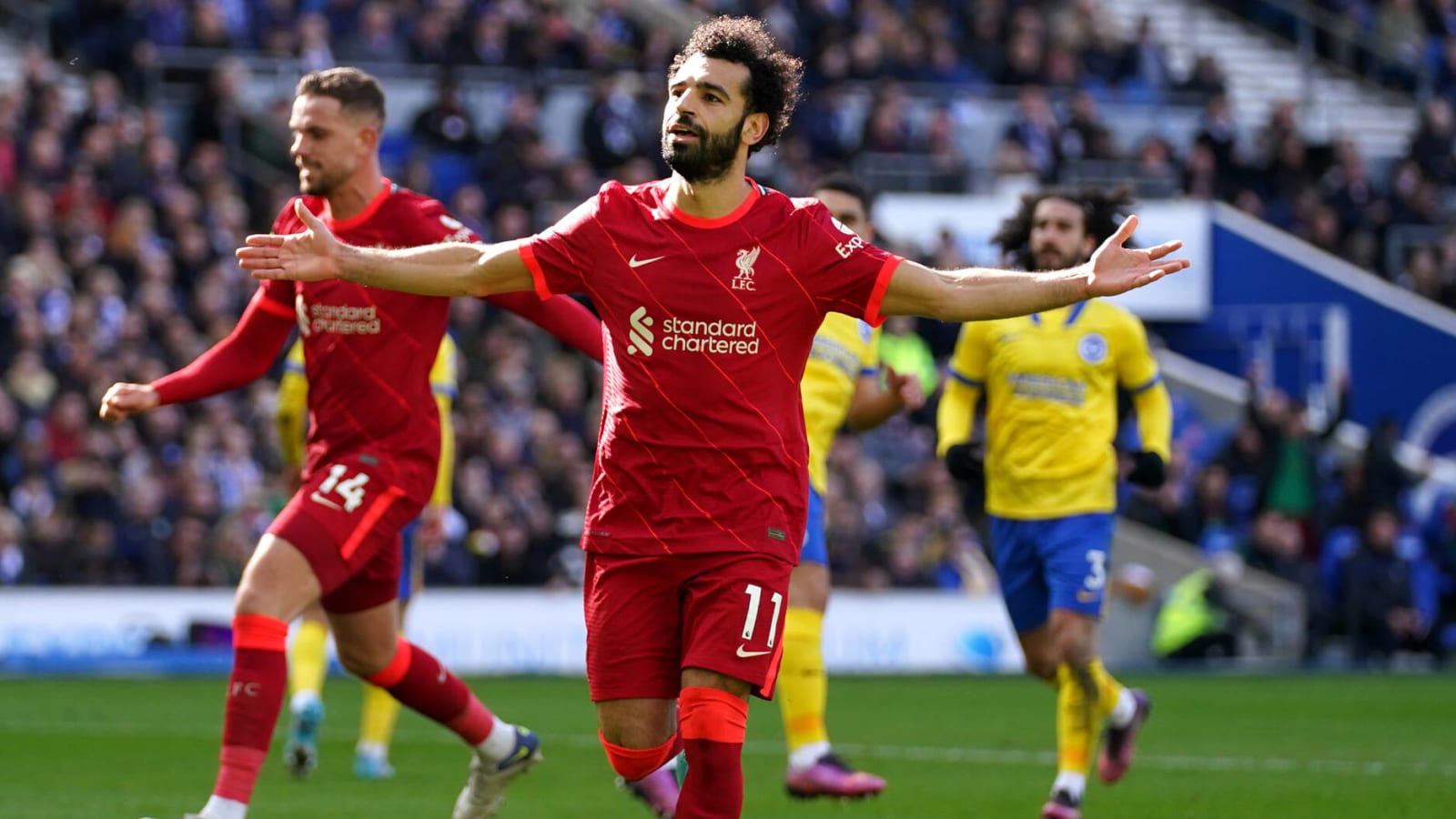 Mohamed Salah signs three-year deal to stay with Liverpool