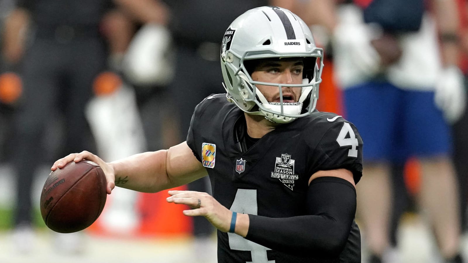 Derek Carr hit in groin after throwing interception