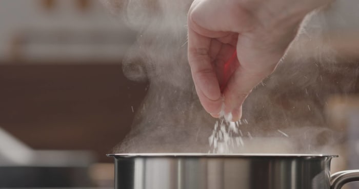 Add salt to boiling water