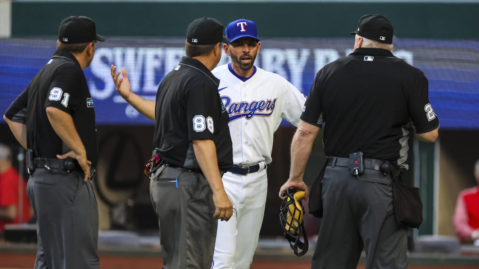 Rangers lose to Rockies on controversial late slide review