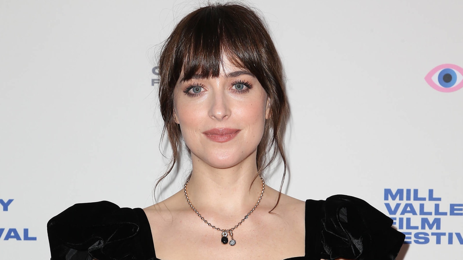 Dakota Johnson calls paparazzi 'invisible germs'