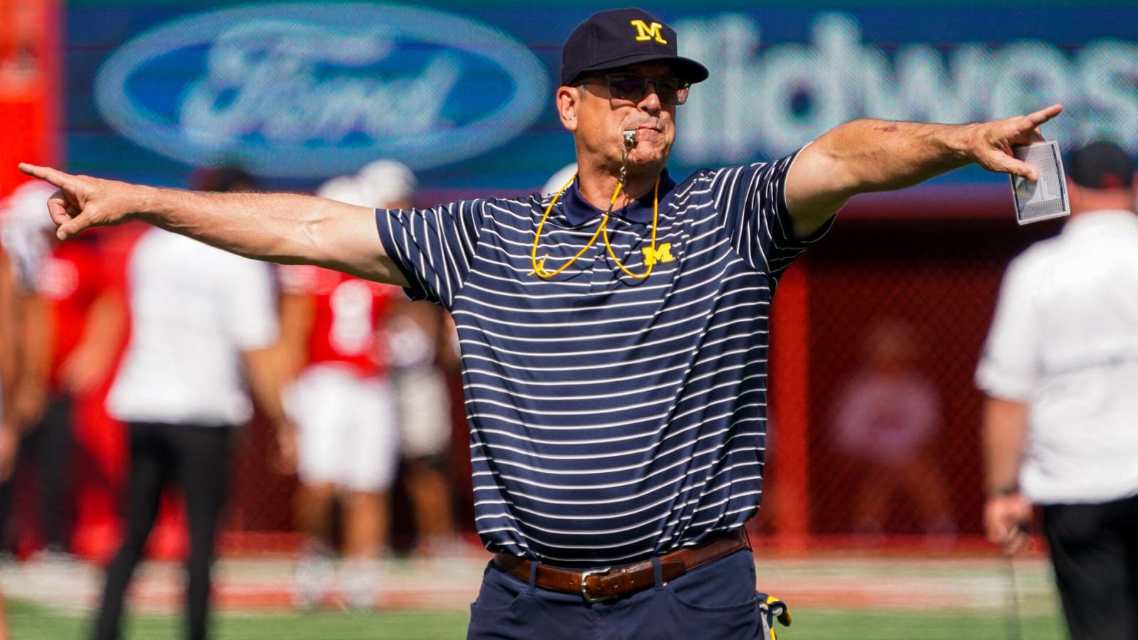 Report: Michigan pursuing new contract for Jim Harbaugh