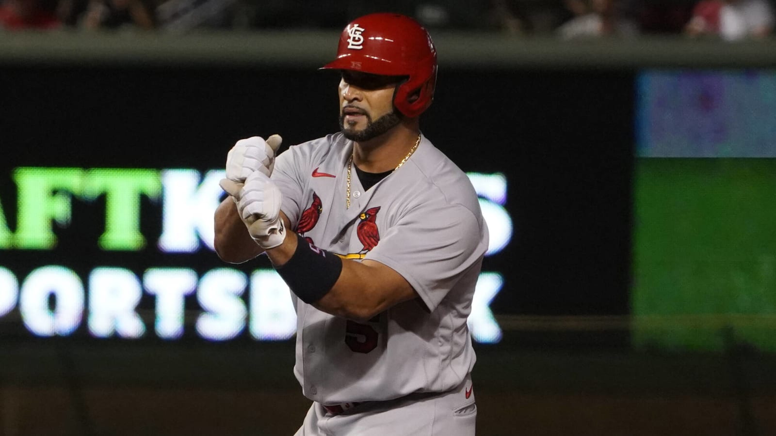 Albert Pujols gives young fan his Cardinals jersey after Cubs game