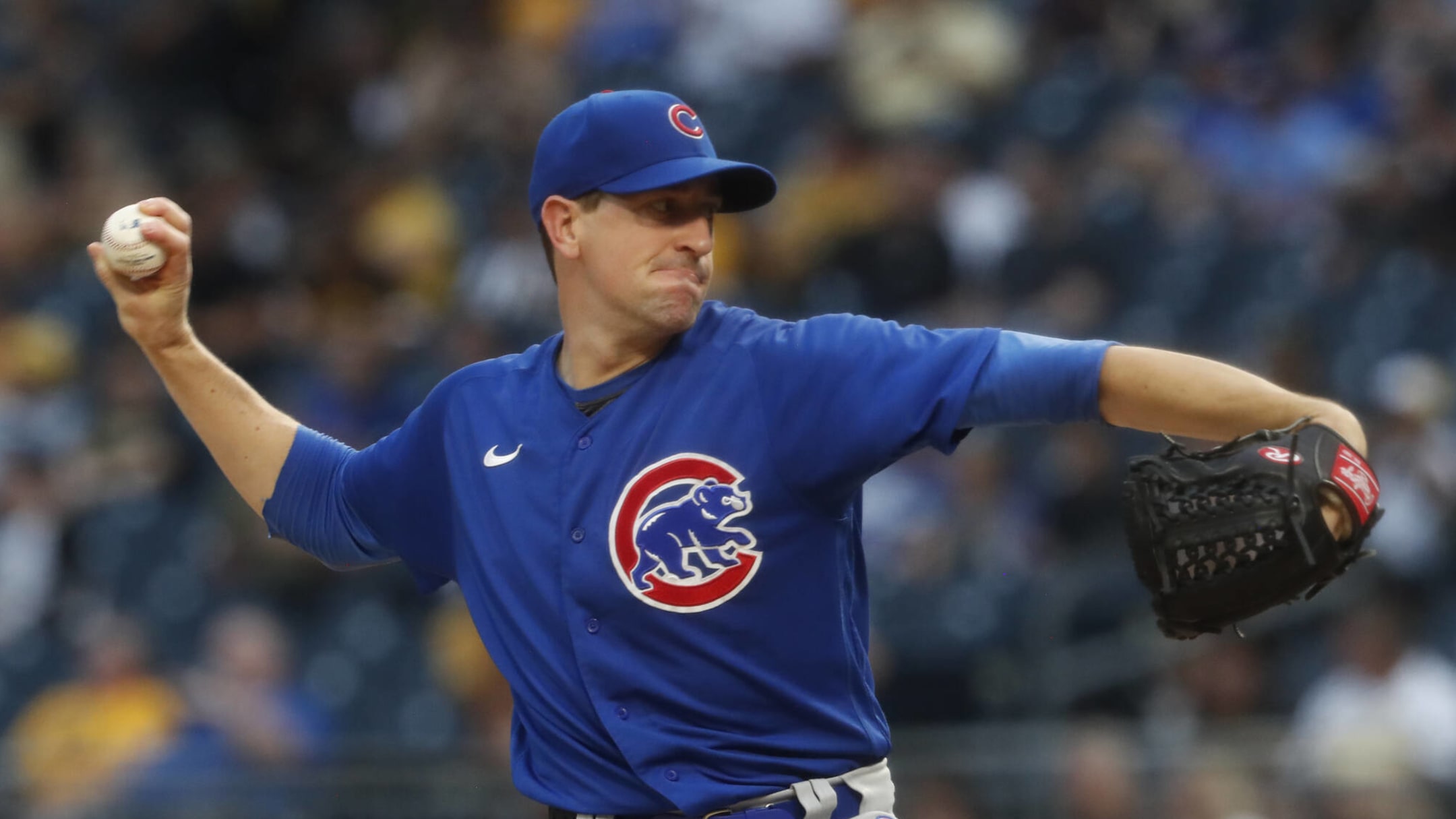 Harden pitches Cubs past Cincinnati, back into first place