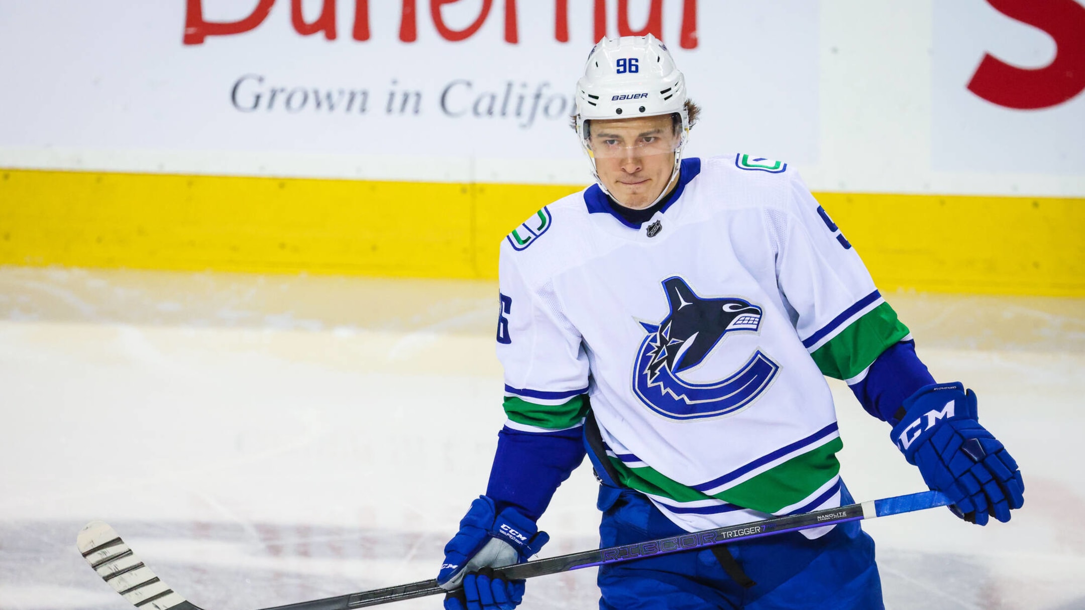 Why did the Canucks sign, rather than trade, Andrei Kuzmenko?