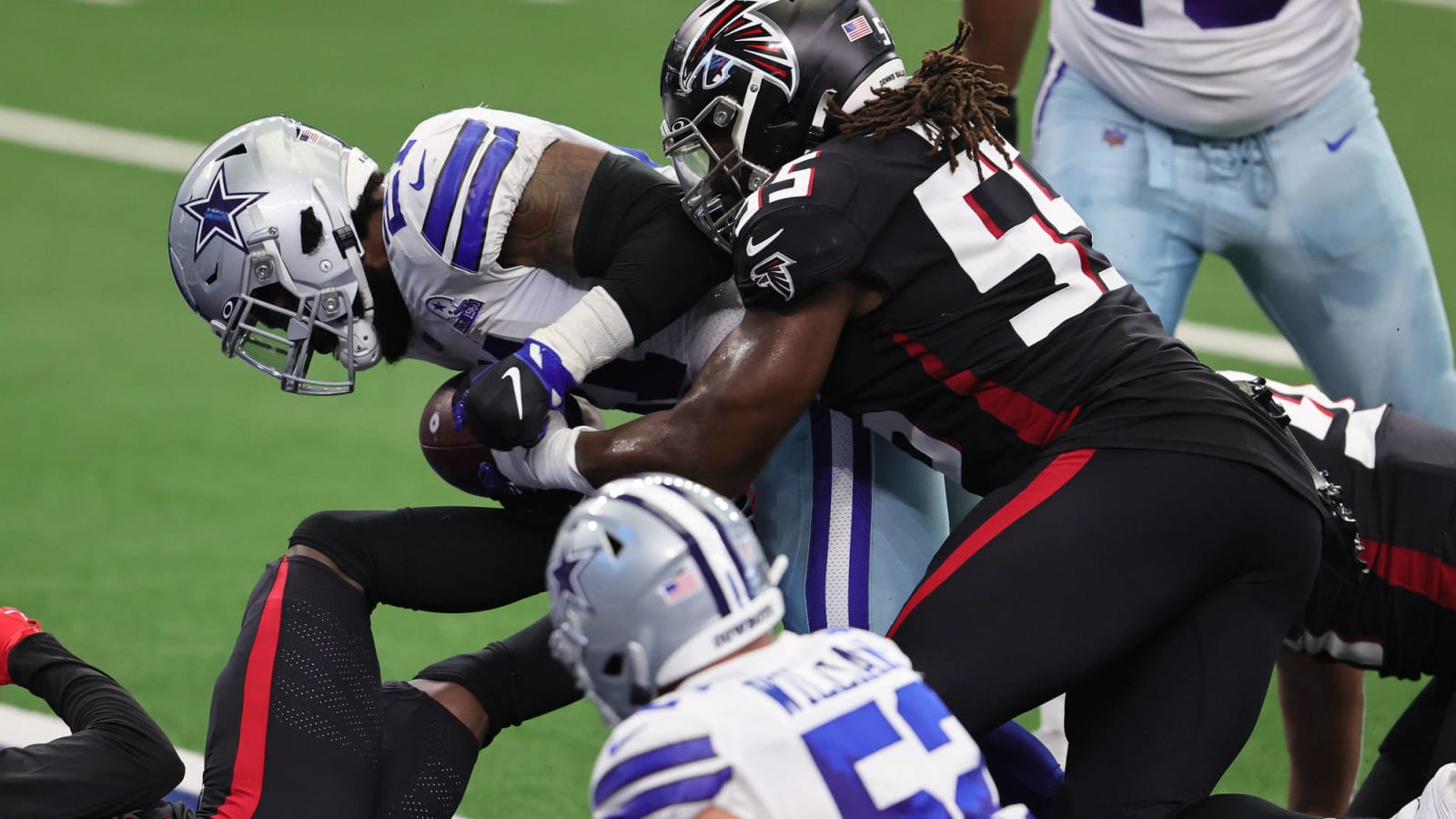 Watch: Ezekiel Elliott lays the boom on Falcons defender for TD