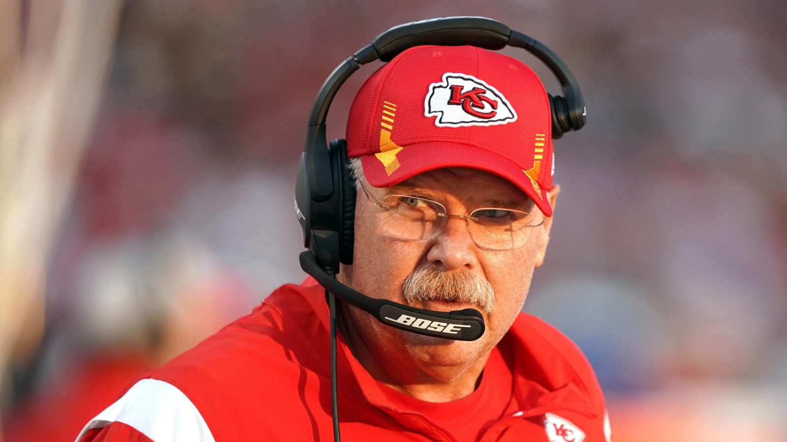 Andy Reid leaves stadium in ambulance after falling ill