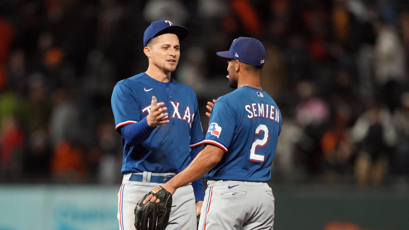 The Rangers' big infield investment is paying off