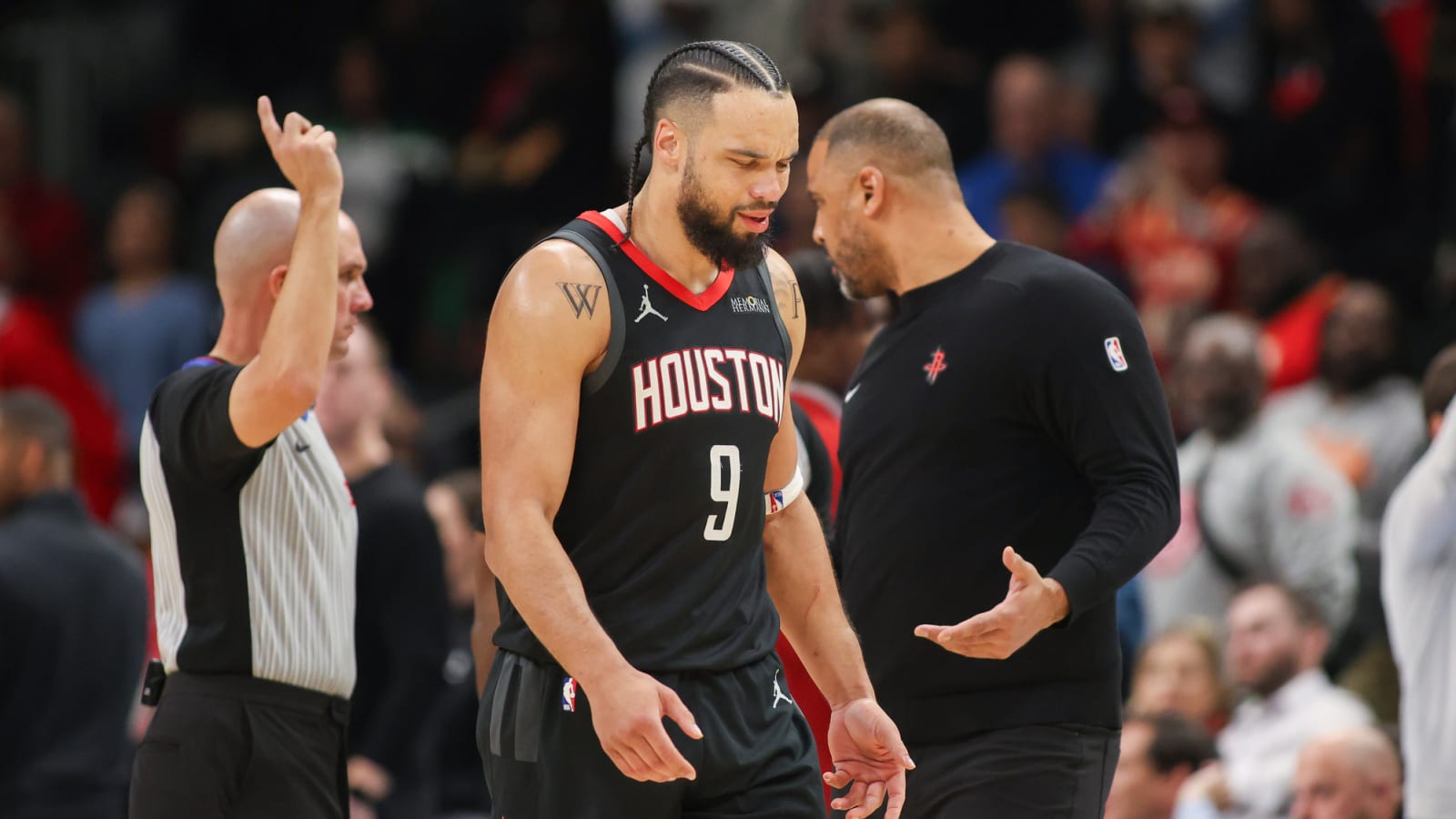 Dillon Brooks puts his hand on Trae Young’s neck