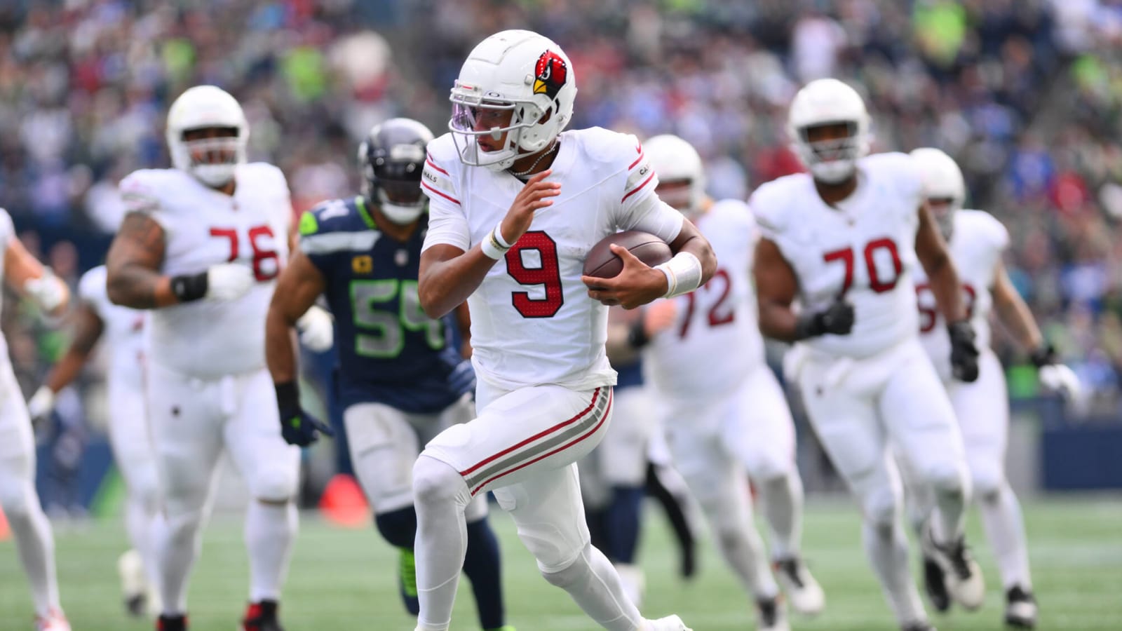 Arizona QB Josh Dobbs weaves his way for a touchdown against Seattle