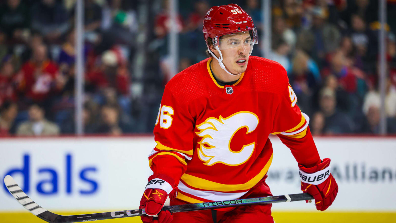 What should the Calgary Flames do with Andrei Kuzmenko?