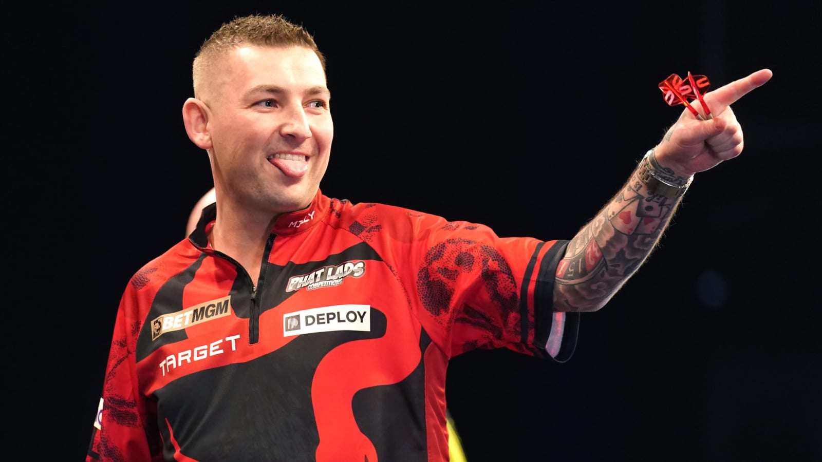 Watch: Nathan Aspinall takes on 9-dart challenge with 50-year-old(!) set of darts